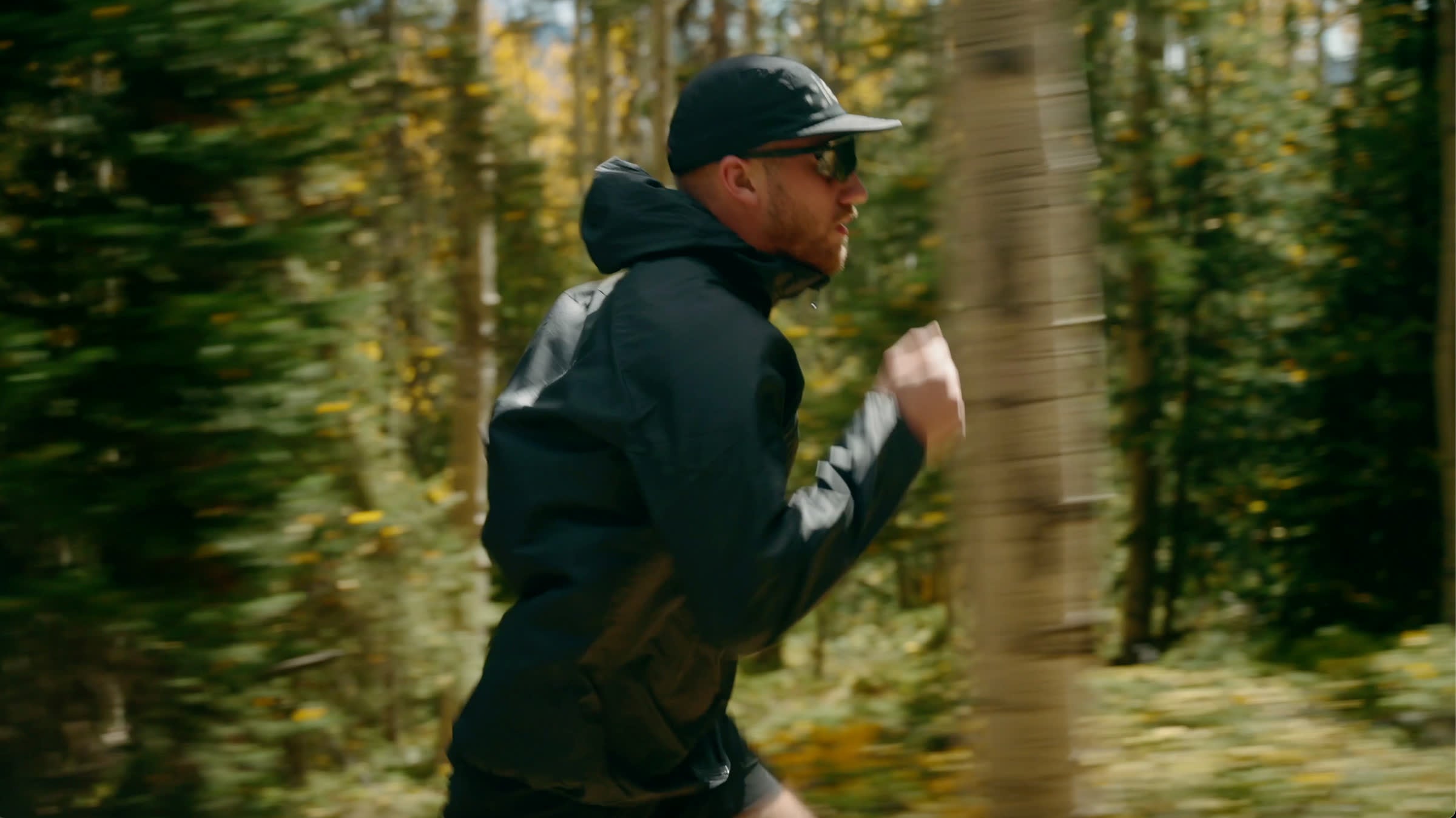 A man running through a forest